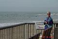 Kathleen at Ventura beach w old geezer surfers in background